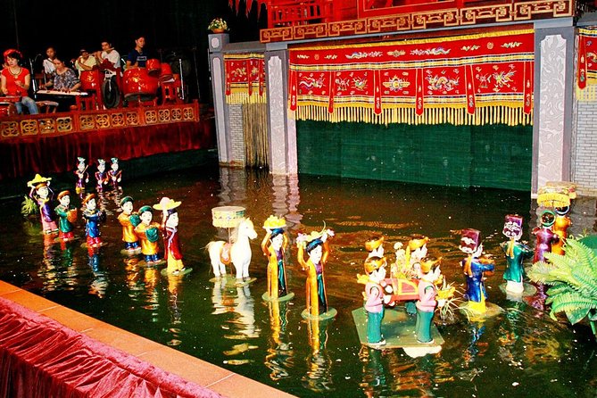 Water Puppet Show Plus Sightseeing By Cyclo and Saigon Dinner Cruise - The Golden Dragon’s water stage